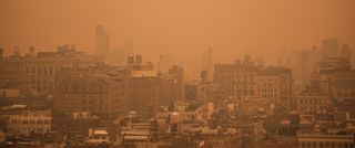 East-facing view of Manhattan’s Soho neighborhood under orange-tinted sky